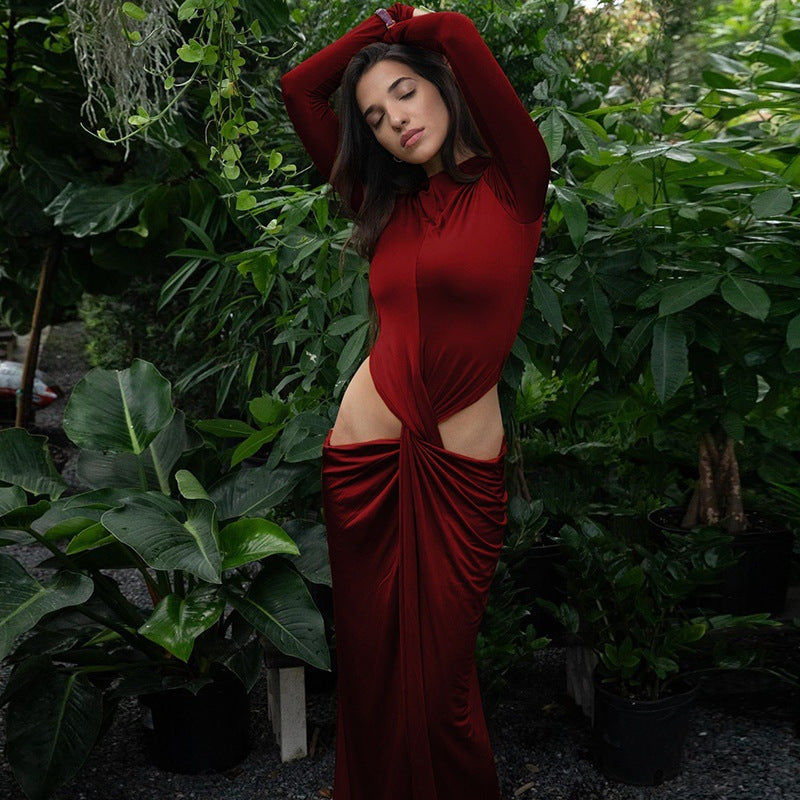 Ladies Elegant maxi dress with long sleeves featuring a refined knotted design and chic side cutouts.