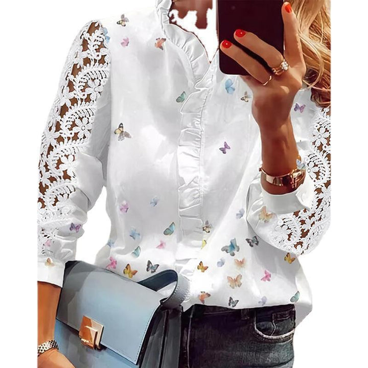 Women's blouse with floral appliqués, ruffle details, and lace sleeves Lune London