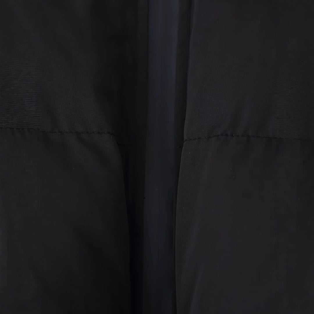 Short down jacket for women with high collar and practical pockets Lune London