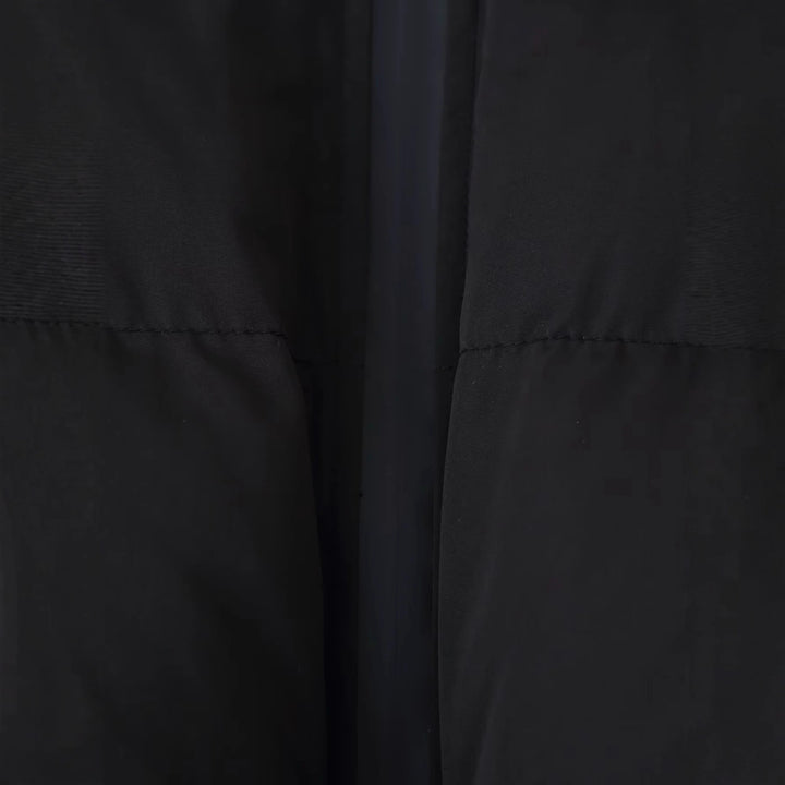 Short down jacket for women with high collar and practical pockets Lune London