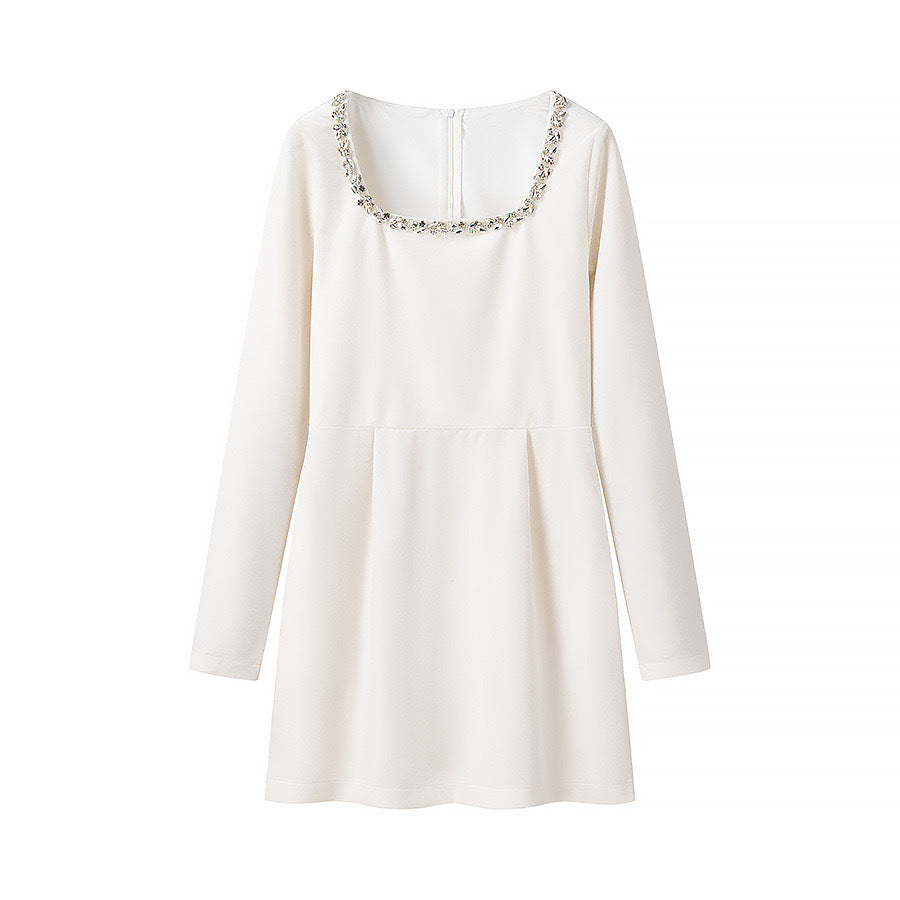 Elegant dress for women with a nice round neckline and decorated chic and stylish details
