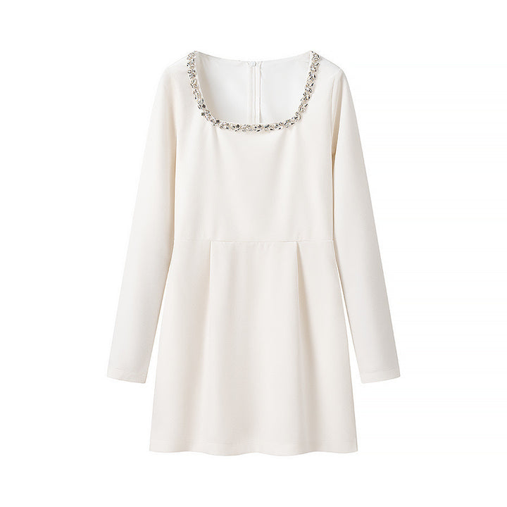 Elegant dress for women with a nice round neckline and decorated chic and stylish details