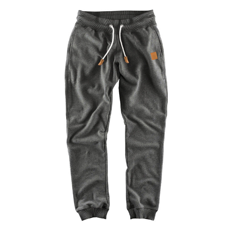 Premium athletic jogger pants for men with elastic waist and functional pockets Lune London