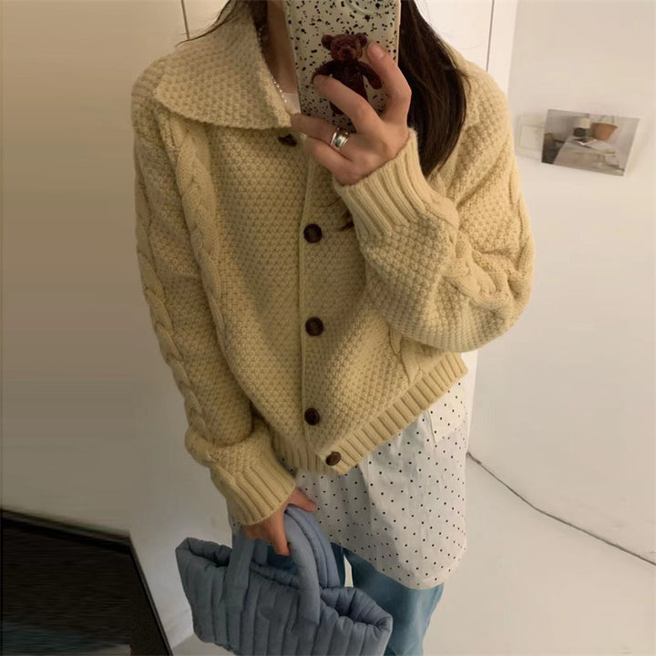 Women thick knit cardigan with contrasting buttons and a textured design Lune London