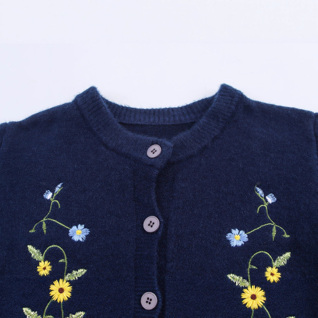 Knitted women's jacket with embroidered floral design and decorative buttons Lune London