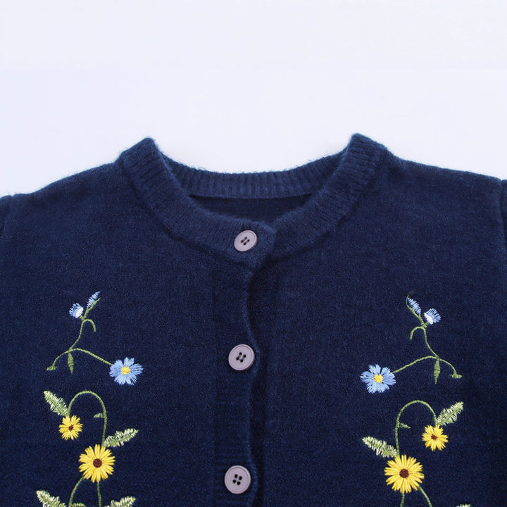 Knitted women's jacket with embroidered floral design and decorative buttons Lune London