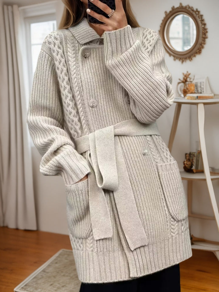 Knitted jacket for women with adjustable belt and textured cable pattern Chic und Stil