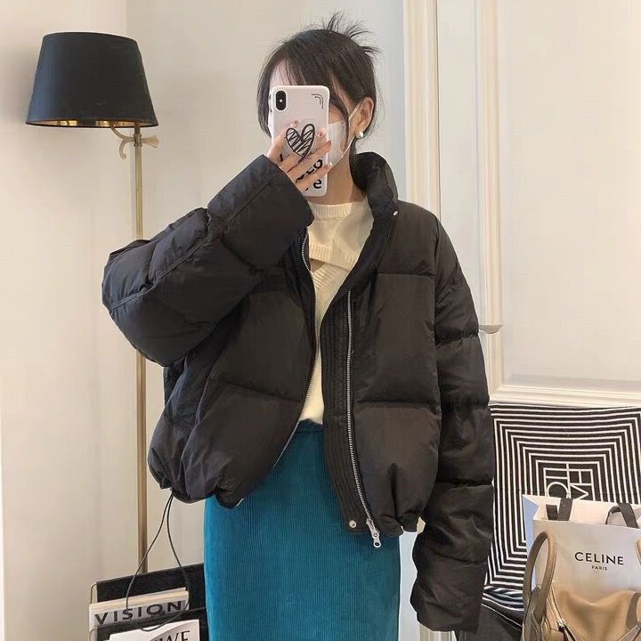 Ladies oversized puffer jacket with elastic waist and side zip pockets Lune London