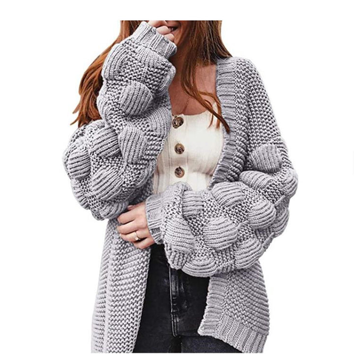 Cardigan pour femmes avec des manches bouffantes décoratives et une coupe ouverte Chic & Stil