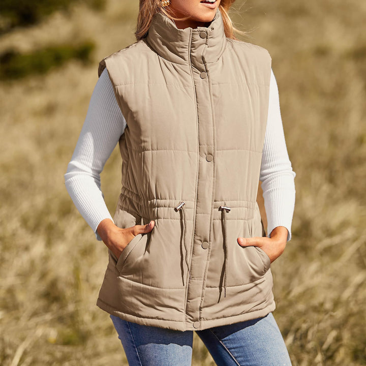 Ladies sleeveless down jacket with high collar and practical zippered pockets Lune Londonl