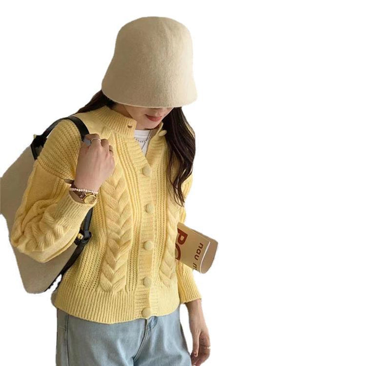 Comfortable knitted cardigan for women with braided pattern and large buttons Lune London
