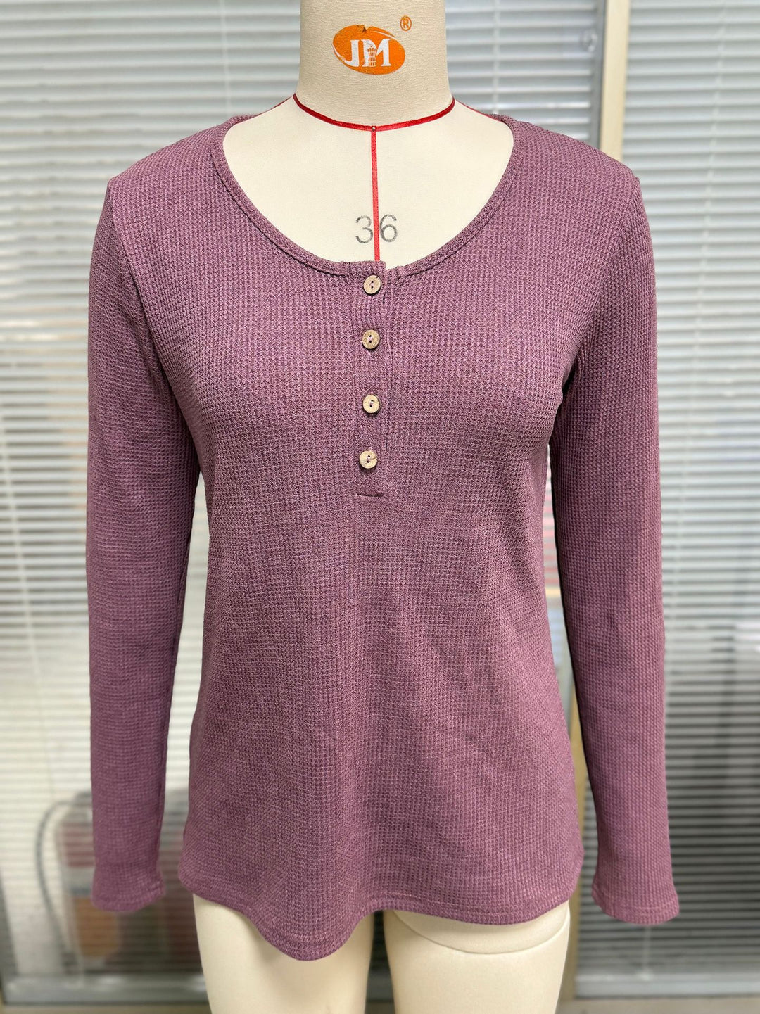 Long sleeve waffle knit t-shirt for women with button placket Lune London