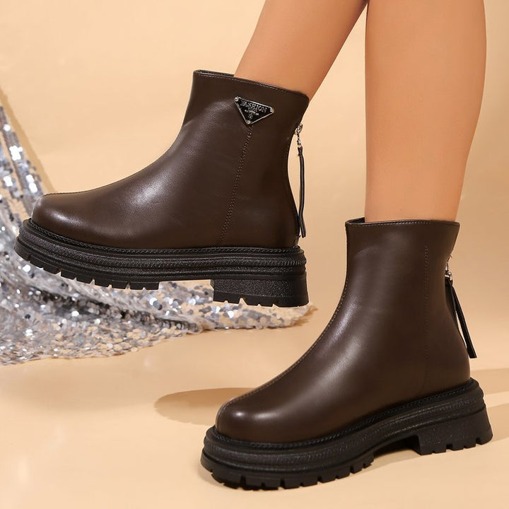 Women’s boots with sturdy rubber profile and stylish zipper Lune London