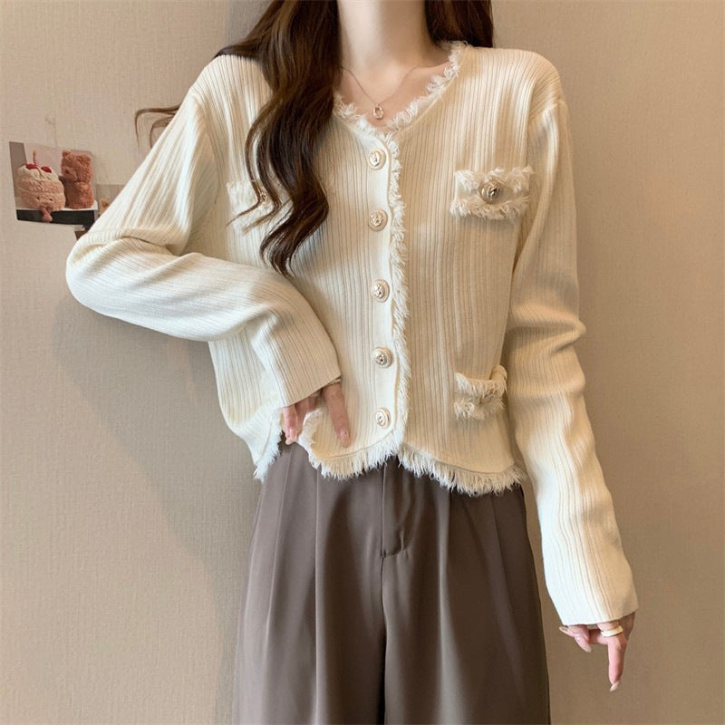 Women comfortable cardigan with subtle fringes and fashionable buttons