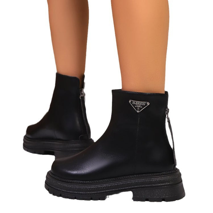 Women’s boots with sturdy rubber profile and stylish zipper Lune London