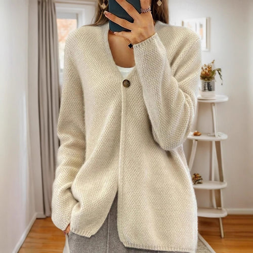 Women's knitted jacket with a fine textured pattern and a button detail Lune London