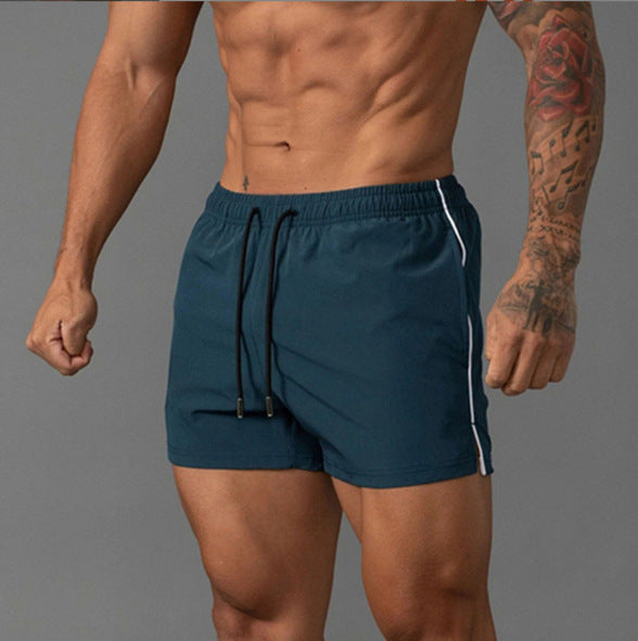 Shorts de bain sportifs pour hommes avec taille élastique et matériau à séchage rapide Lune London