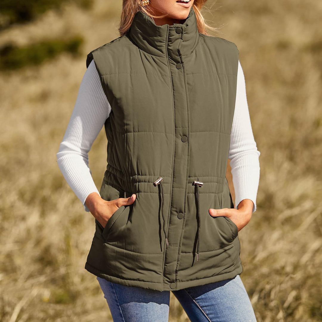 Ladies sleeveless down jacket with high collar and practical zippered pockets Lune Londonl
