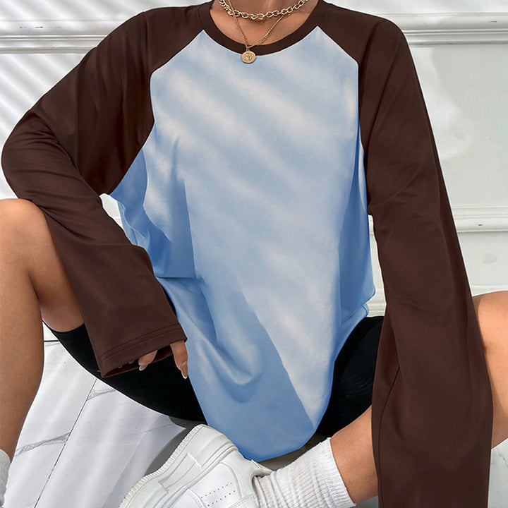 T-shirt à manches longues pour femmes avec une coupe raglan sportive et un design color block tendance Chic & Stil