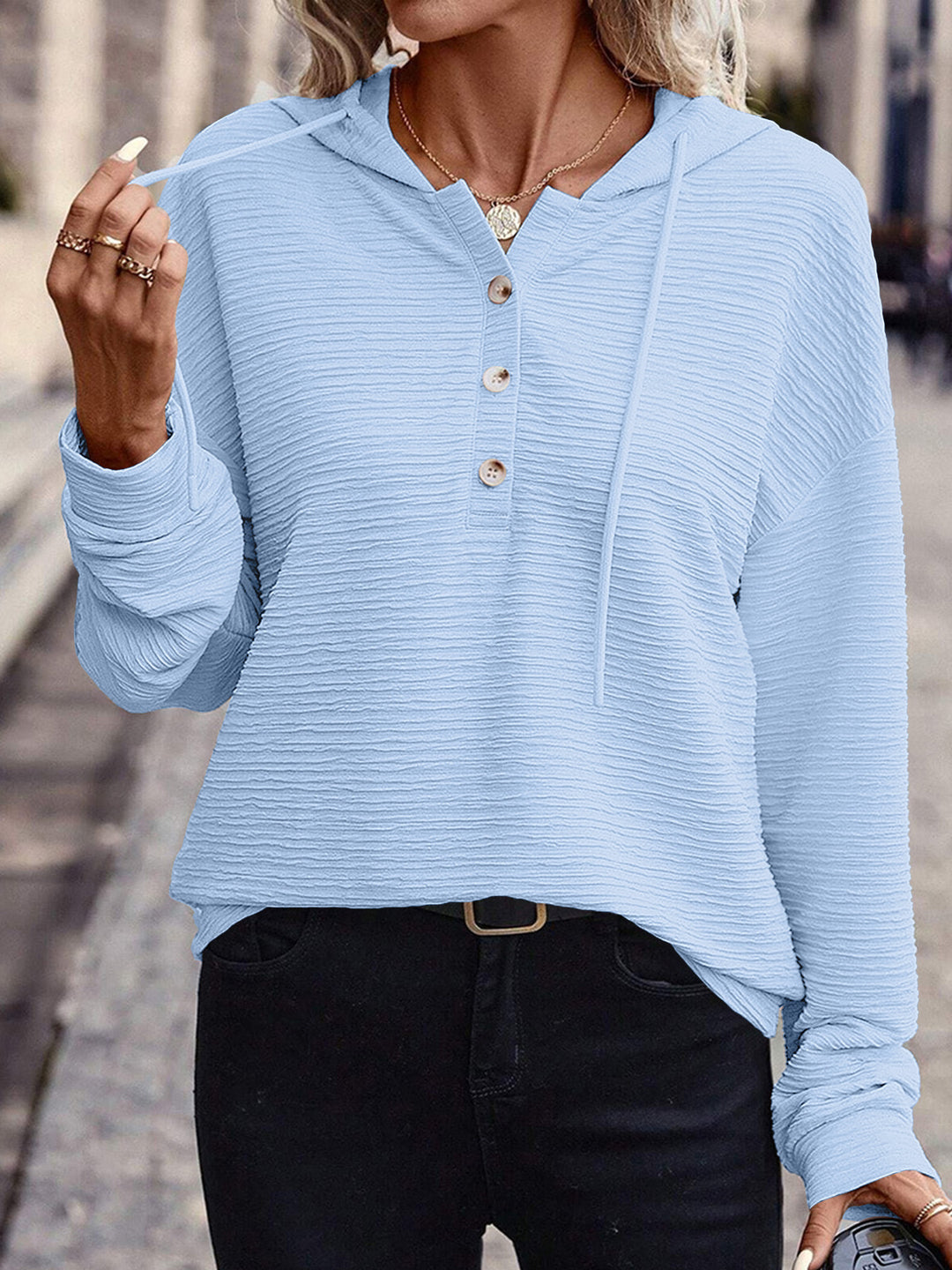 Women's textured fabric hoodie with stylish button details Lune London