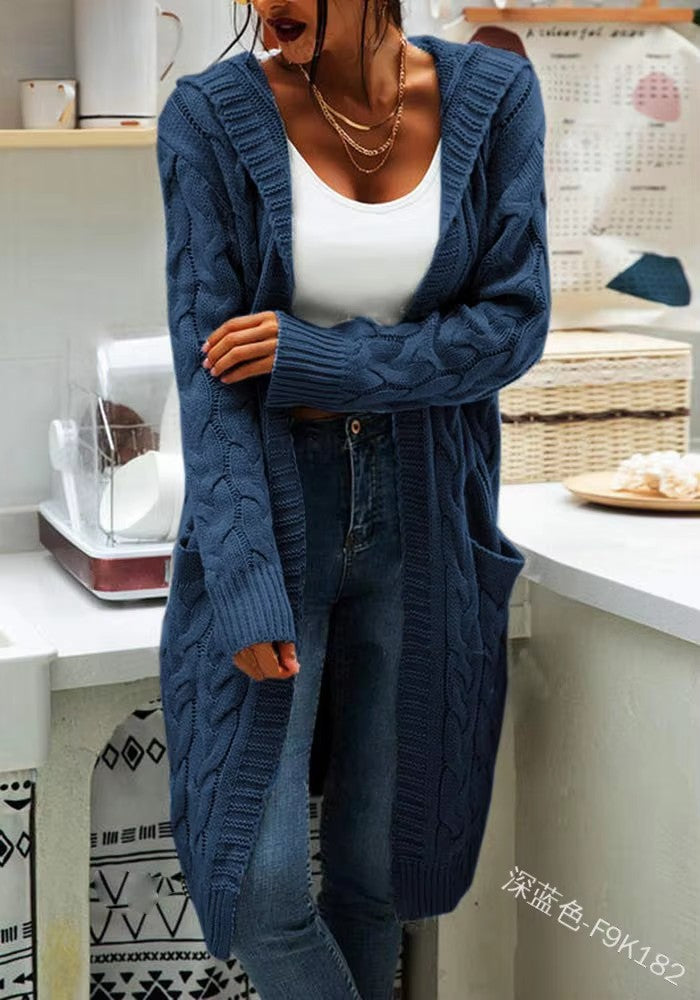 Ladies chunky knit cardigan with side pockets and structured cable design Lune London
