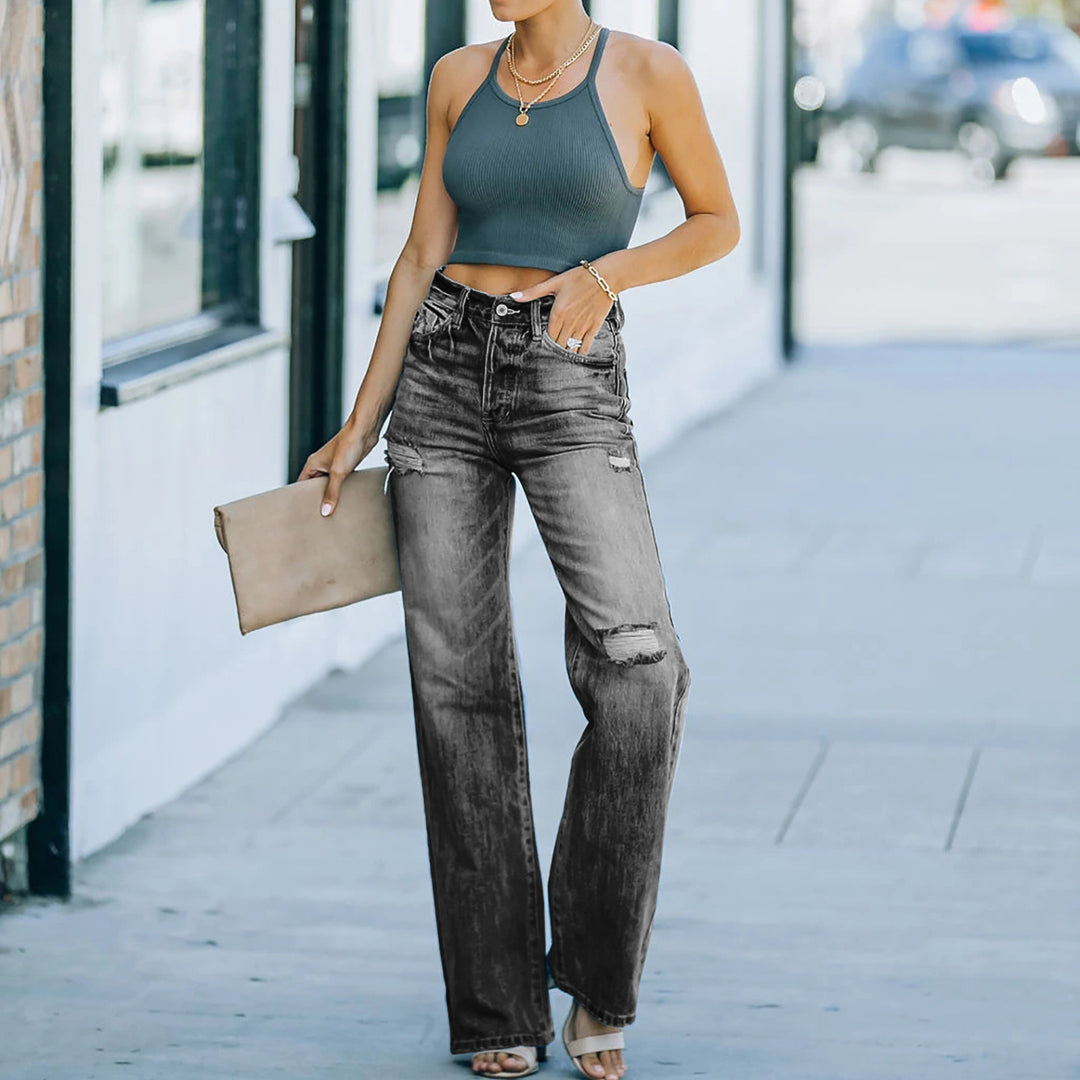 Women's wide-cut jeans with distressed effects and high waist