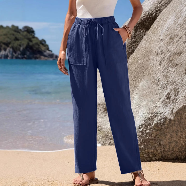 Loose beach pants for women with elastic waistband and practical pockets Lune London