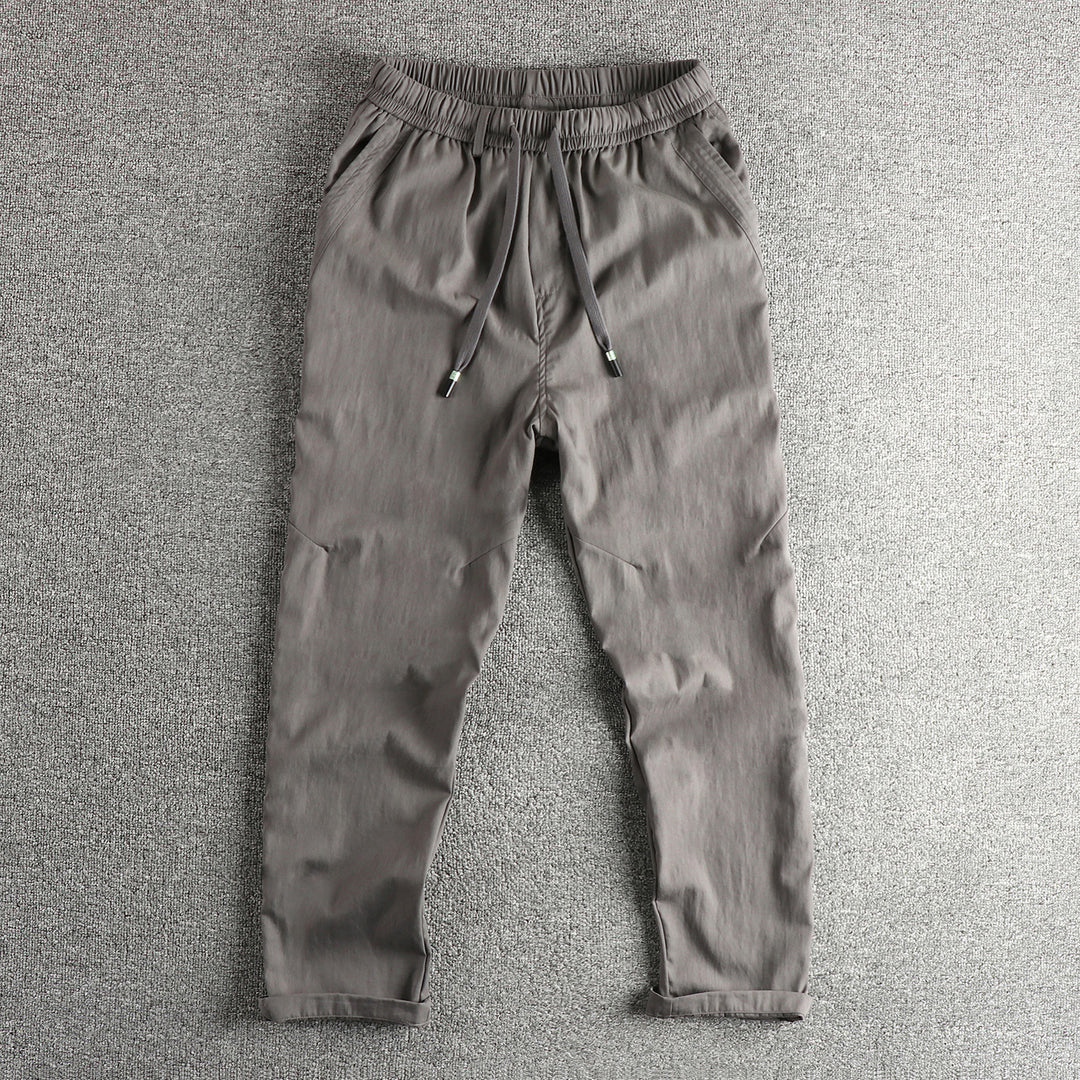 Men's athletic leisure pants with elastic waistband and practical drawstring Lune London