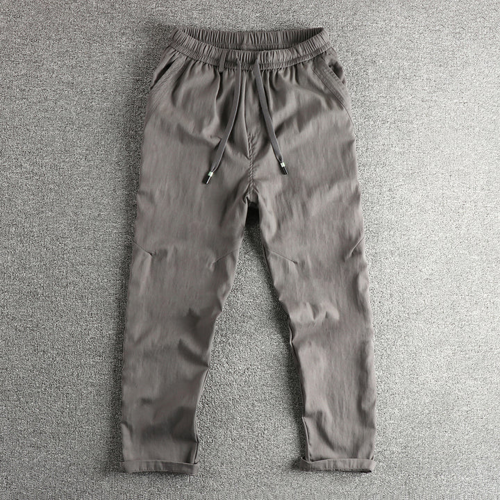 Men's athletic leisure pants with elastic waistband and practical drawstring Lune London