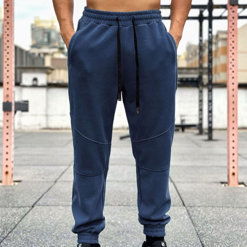 Men's sporty jogging pants with elastic waistband and practical side pockets Lune London