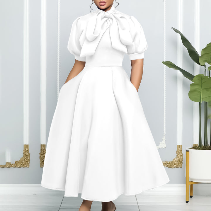 Midi dress for women with an elegant bow and puff sleeves Lune London