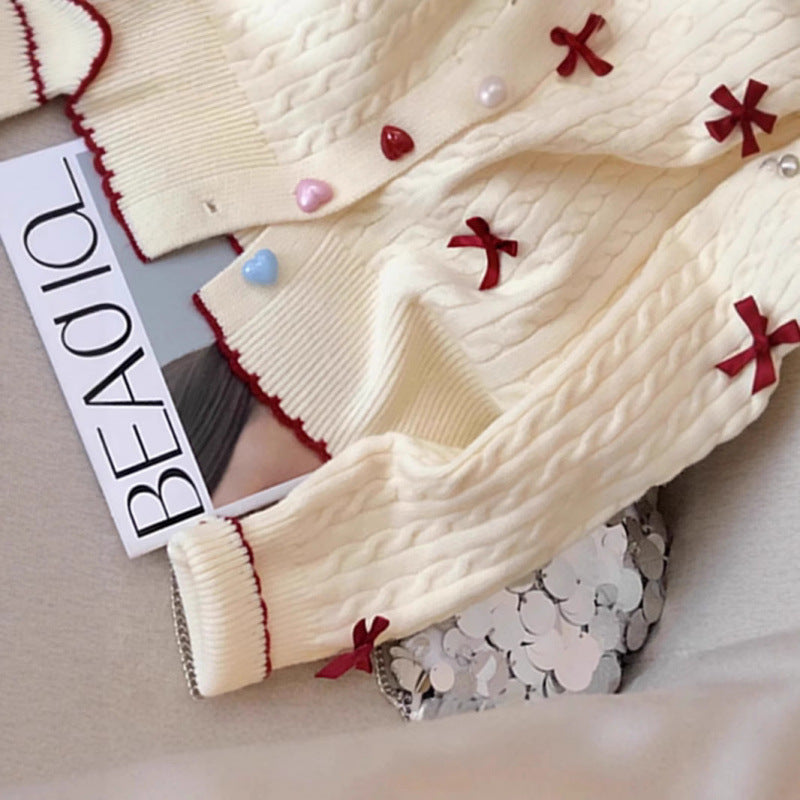 Cardigan en tricot épais pour femmes avec des détails de boutons ludiques et des nœuds
