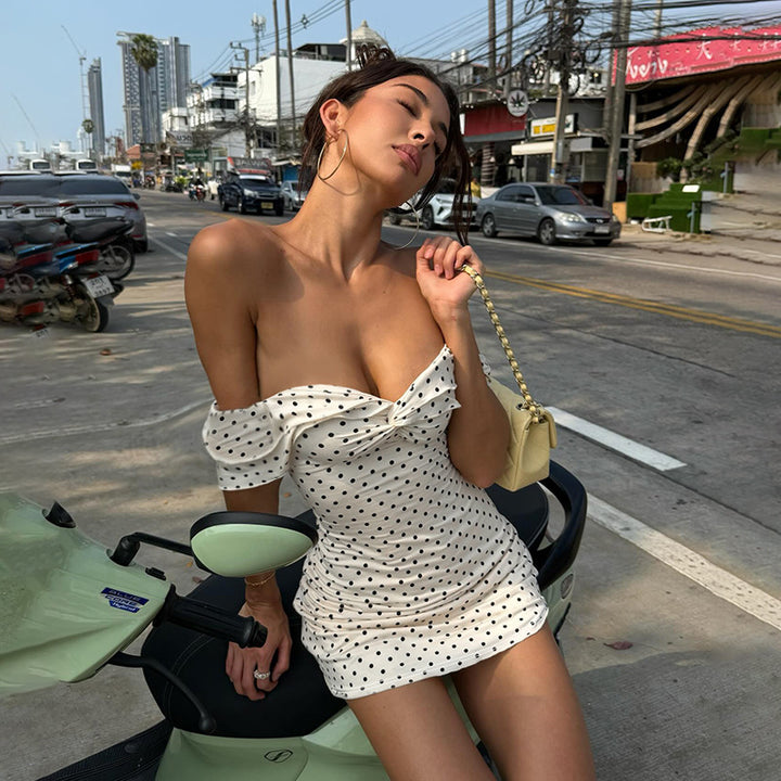 Women's mini dress with off-shoulder design and playful polka dot pattern Lune London