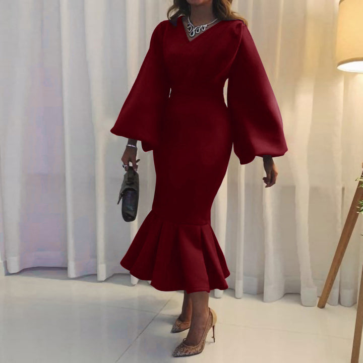Fitted dress for women with voluminous sleeves and a flowing hem Lune London