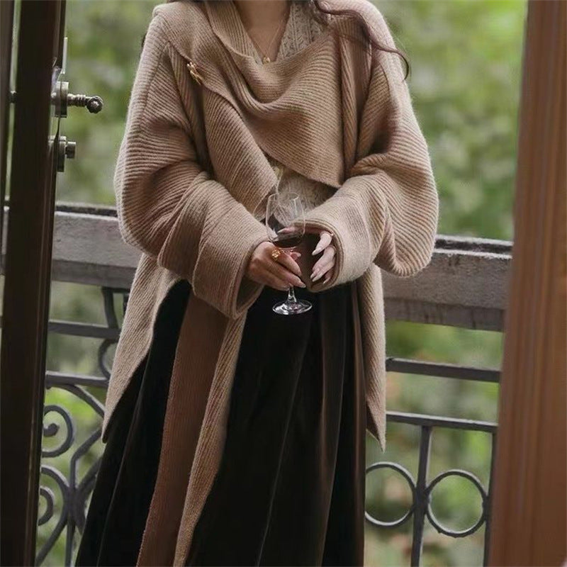 Pull en tricot épais pour femmes avec coupe asymétrique et manches volumineuses Chic & Stil