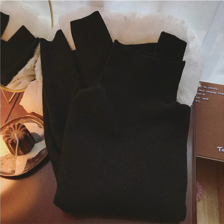 Pull à col montant pour femme en maille côtelée fine Chic & Stil