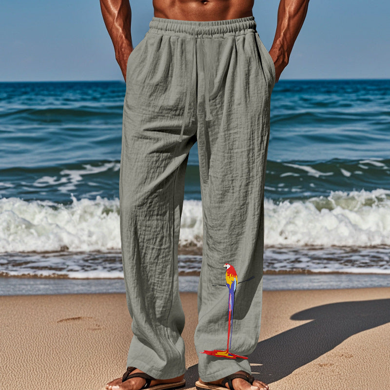 Casual beach pants for men with elastic waistband and colorful bird pattern Lune London