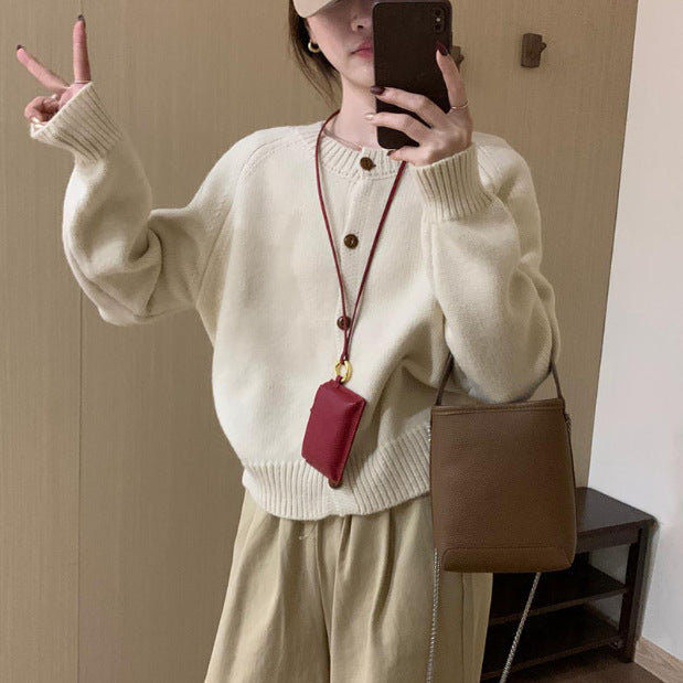 Comfortable knit sweater for women with button details and dropped shoulders Lune London