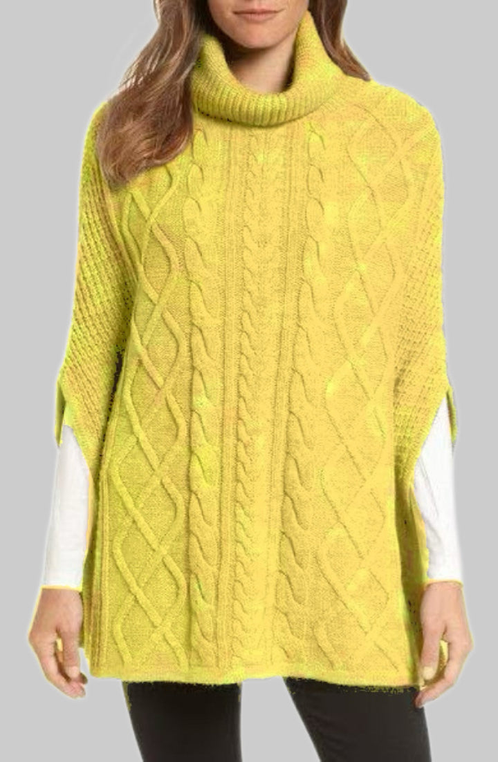 Knitted poncho for women with high collar and classic cable knit pattern Lune London