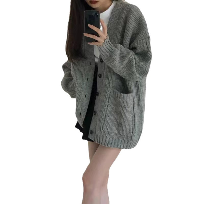 Oversized knit jacket for women with button closure and practical pockets Lune London