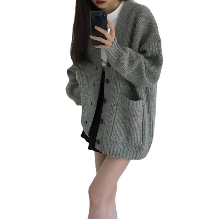 Oversized knit jacket for women with button closure and practical pockets Lune London