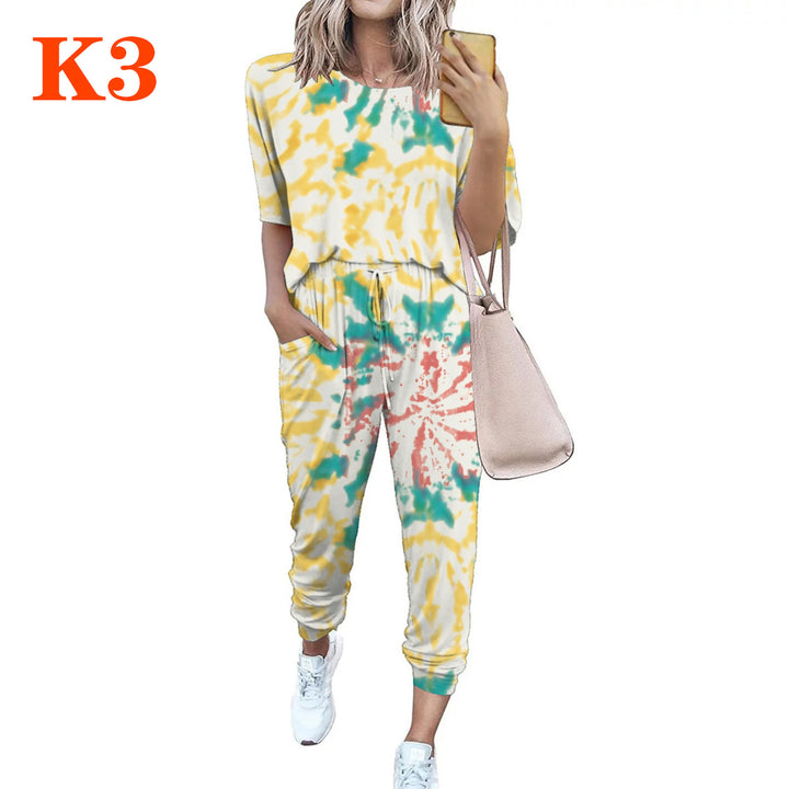 Ladies lightweight casual jumpsuit with a striking tie-dye pattern and practical pockets Lune London