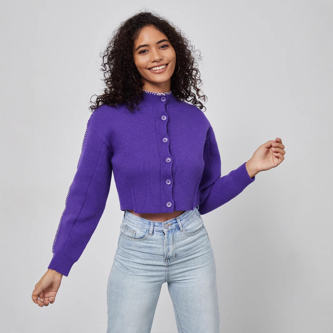 Cropped knitted jacket for women with decorative button details Lune London