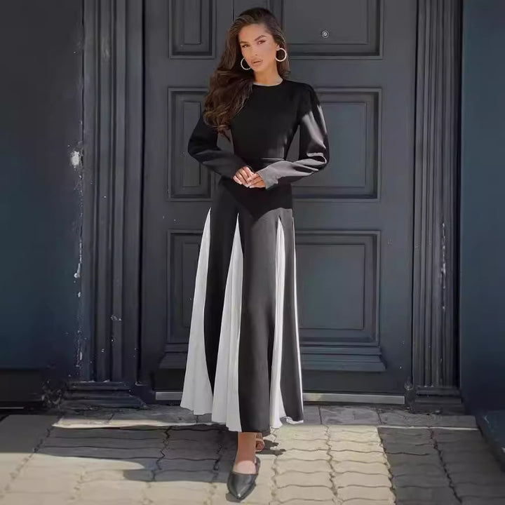 Elegant long dresses for women with puff sleeves and a flowing hem Lune London