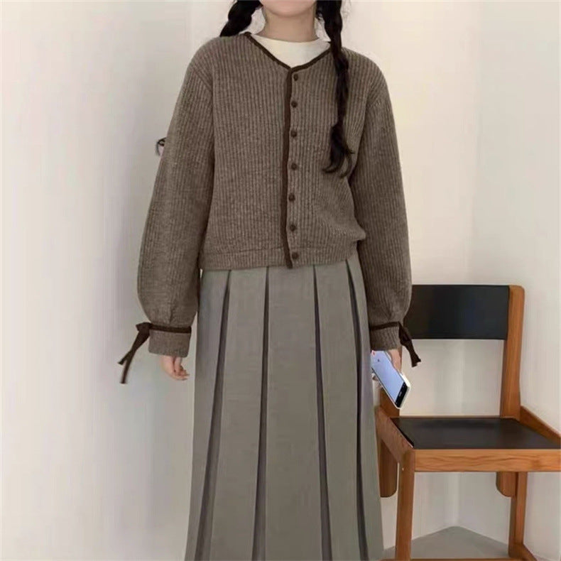 Cardigan for women with contrasting finishes at the sleeves and button placket Lune London