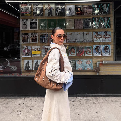 Designer handbag for women with decorative bead details and a unique cut Lune London