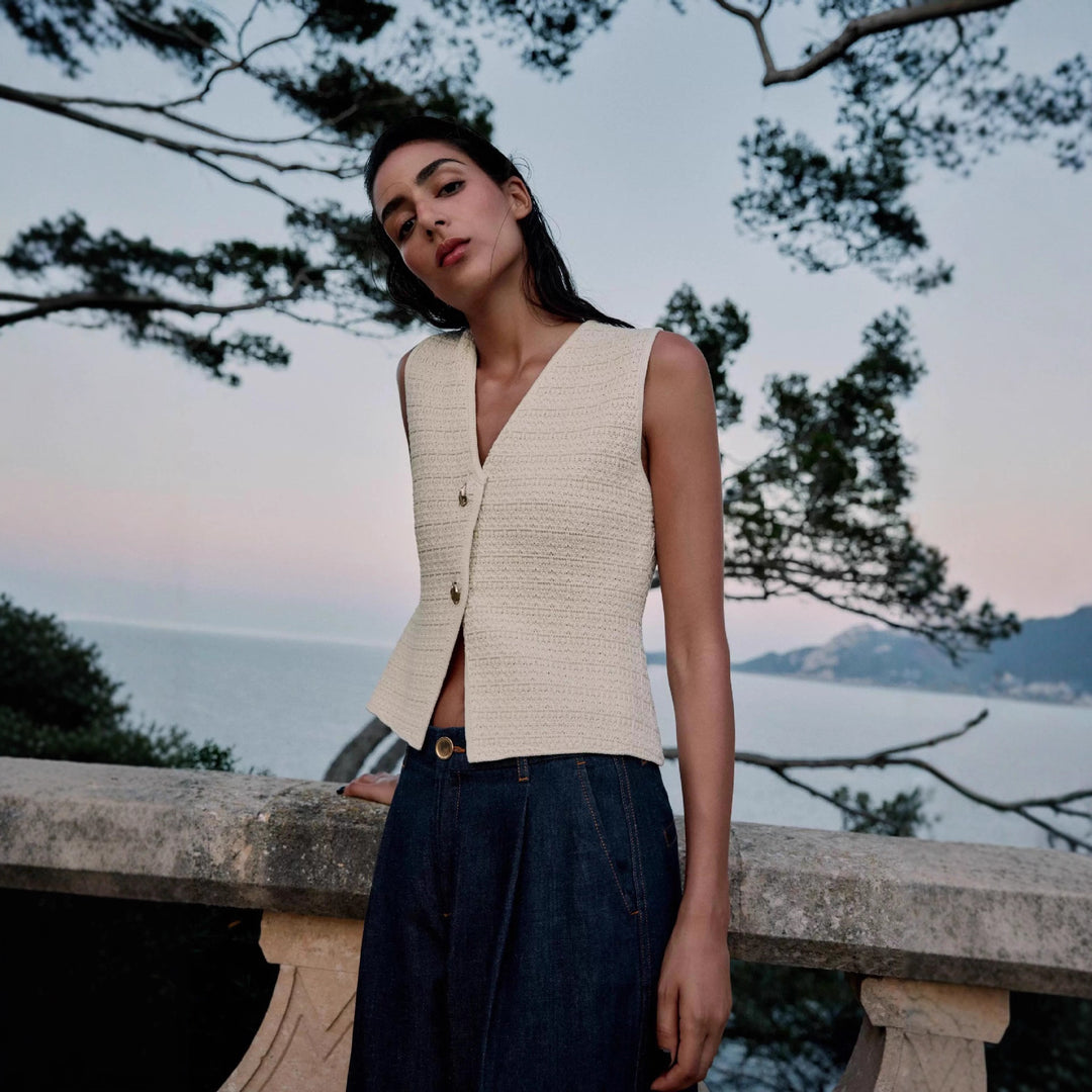 Ladies sleeveless cardigan with decorative buttons and beautiful texture Lune London