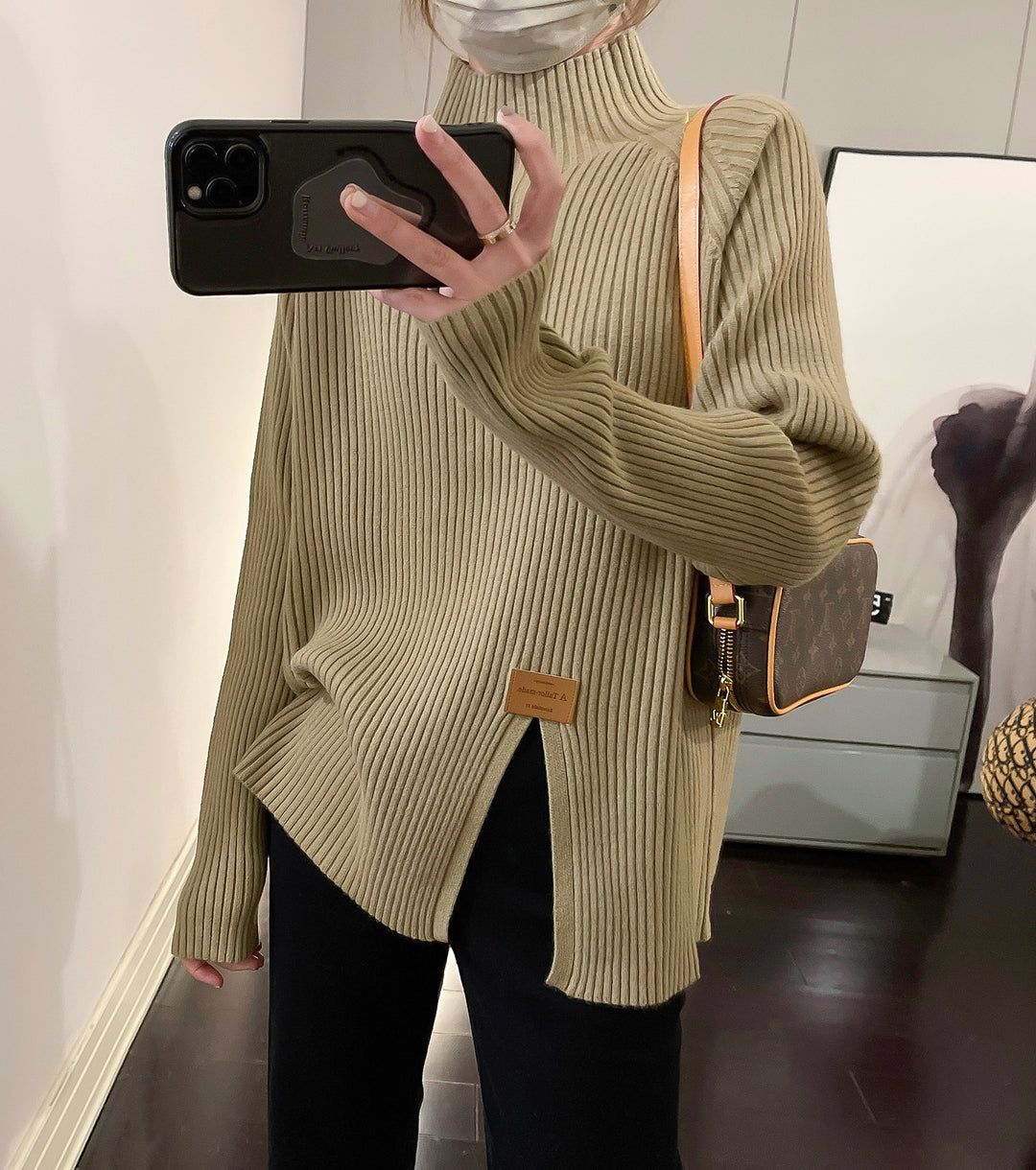 Ladies Modern Knit Sweater with High Collar and Chic Asymmetrical Cut