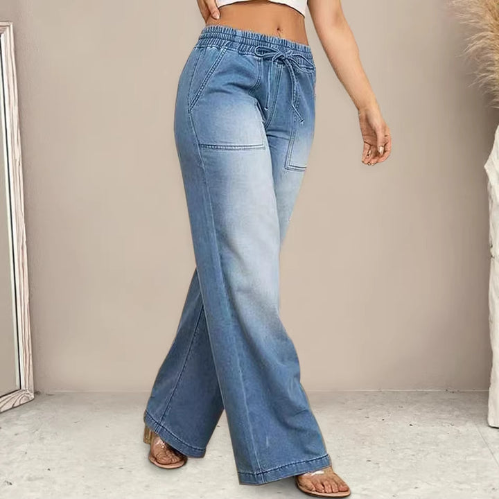 Women's wide-cut jeans with elastic waistband and trendy used look