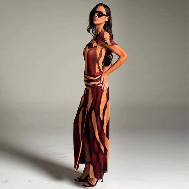 Women's maxi dress with asymmetric cut and exciting graphic design
